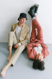 Two men in suits posing